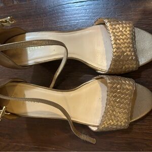 Gorgeous Cole Haan size 7 1/2 gold heels. Gently used.